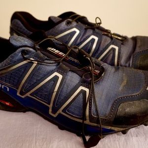 Men’s Salomon running shoes, slightly used. Plenty of tread left.